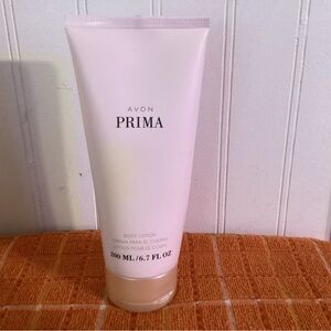 Avon Prima Body Lotion. Pre-owned, original amount 6.7 oz.
